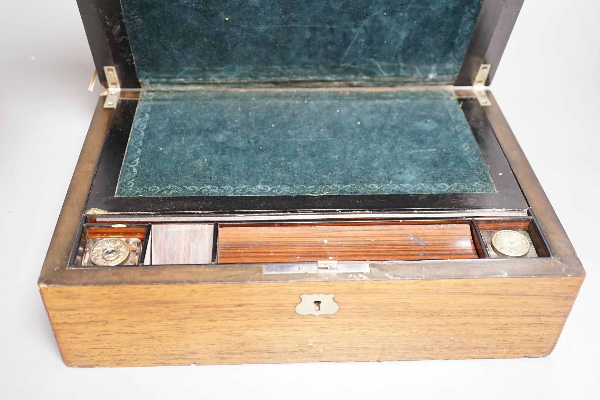 A writing slope, box and miniature Stanley sextant